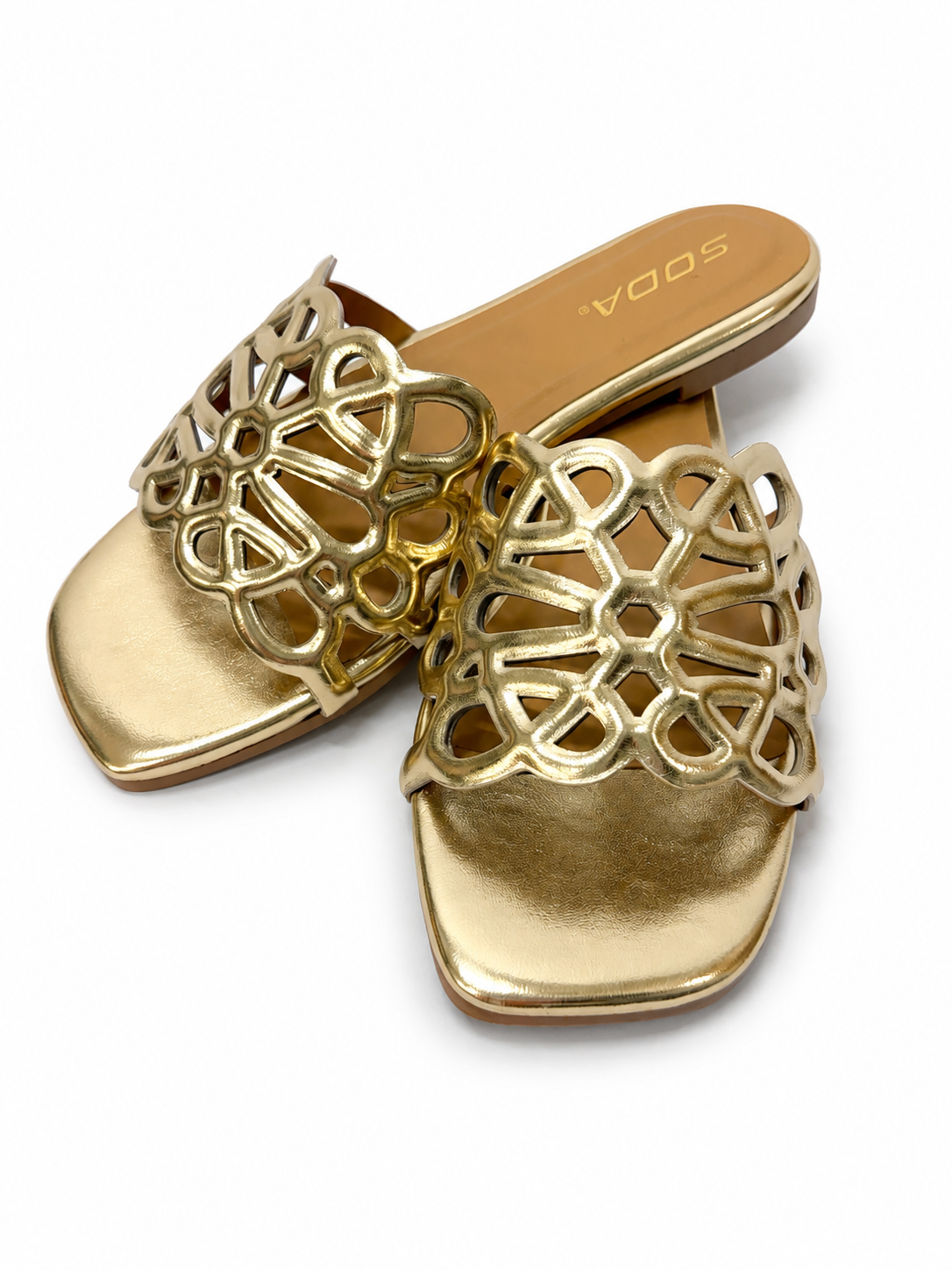 Soda gold metallic flat slide sandals with intricate cutout lattice design on square toe strap.