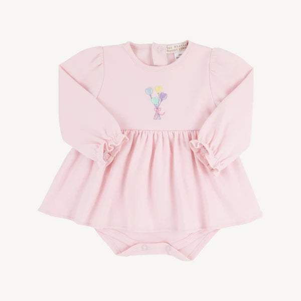 Pink long sleeve baby dress with daisy embroidery and ruffle cuffs featuring attached diaper cover.