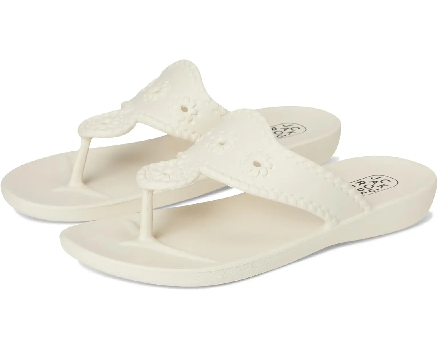 White Eva flip-flop sandals with decorative braided straps and flat soles, displayed as a pair.