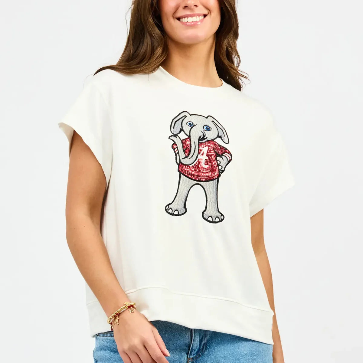 White short-sleeve sweatshirt tee featuring embroidered sequin Alabama Crimson Tide elephant mascot graphic.