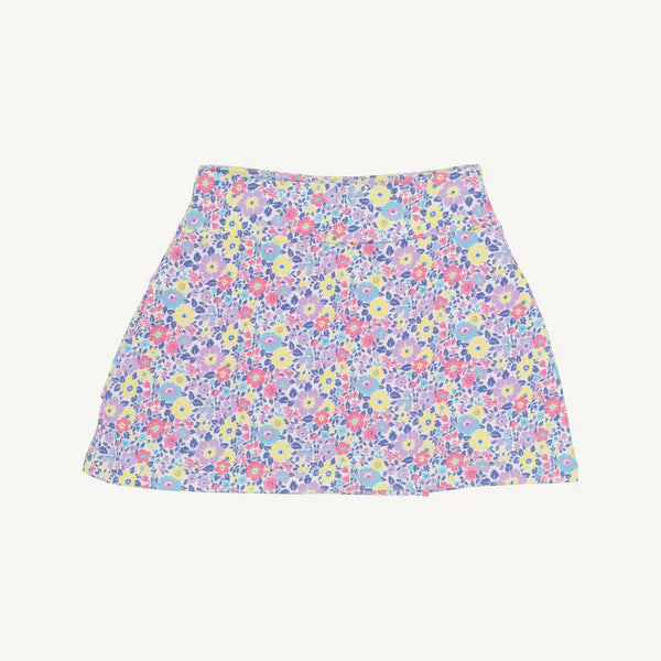Baby skort in purple with colorful floral print pattern featuring pink, yellow, and blue flowers.