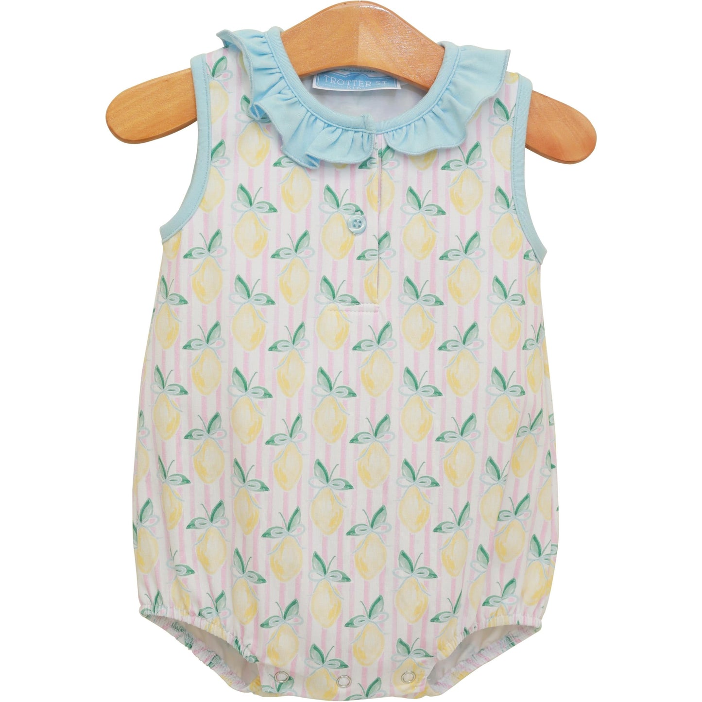 Baby bubble romper with yellow lemon print and light blue ruffled collar on wooden hanger