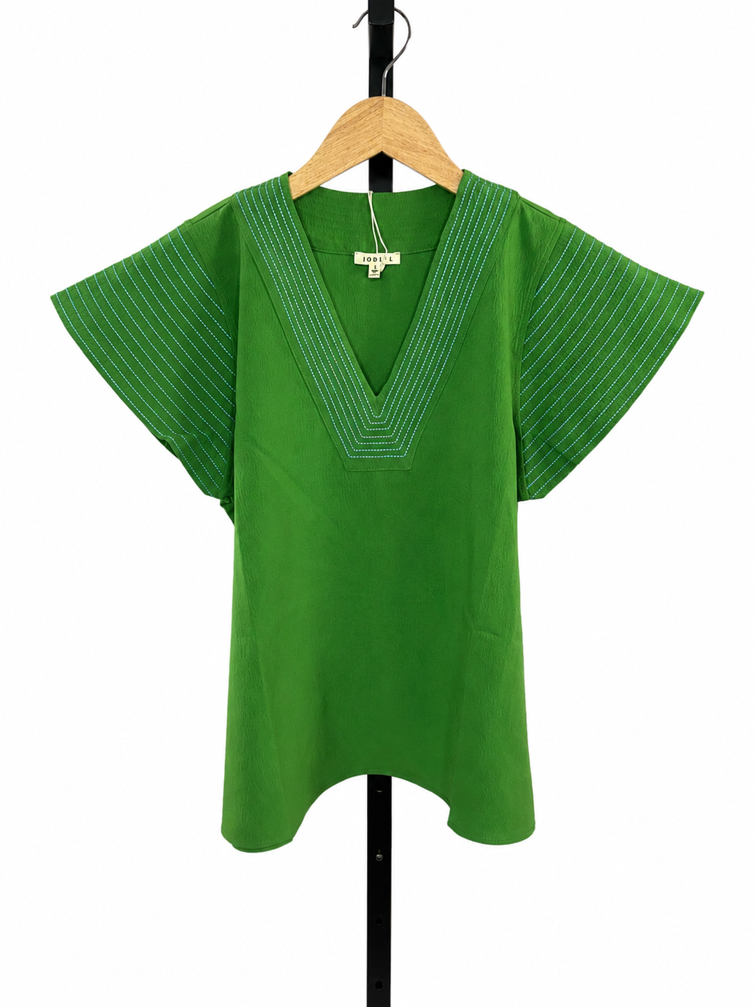 Green flutter-sleeve V-neck top with decorative white and blue stitching detail on neckline and sleeves.