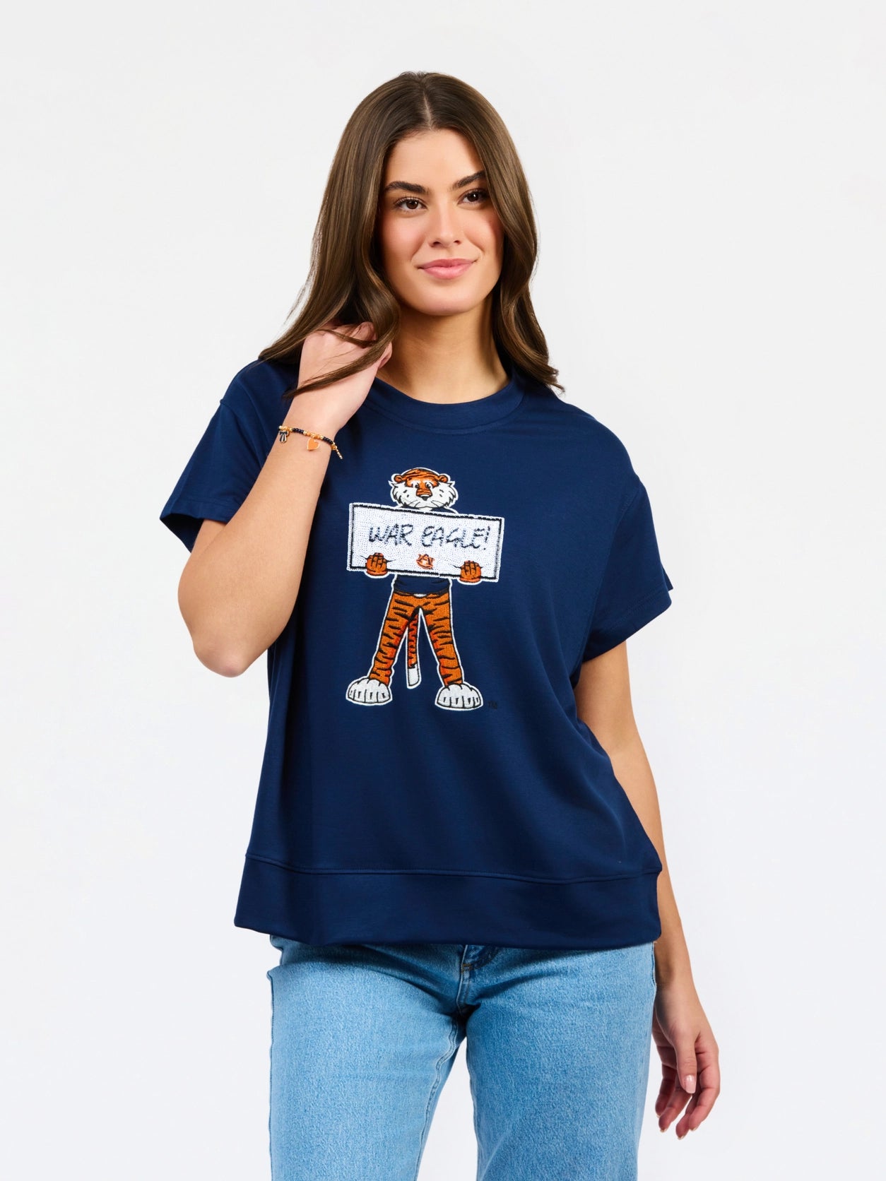 Navy blue short-sleeve tee featuring embroidered Aubie tiger mascot holding "War Eagle!" sign.
