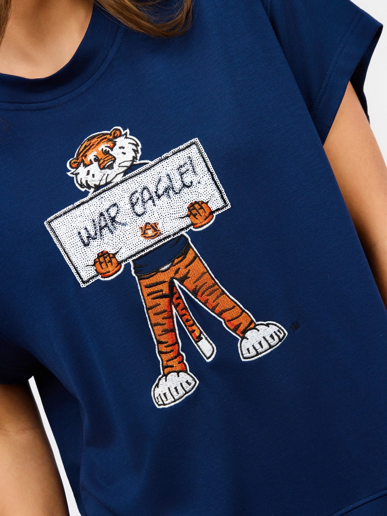 Navy blue sleeveless tee featuring Aubie the Tiger mascot holding a sequined "War Eagle!" sign.