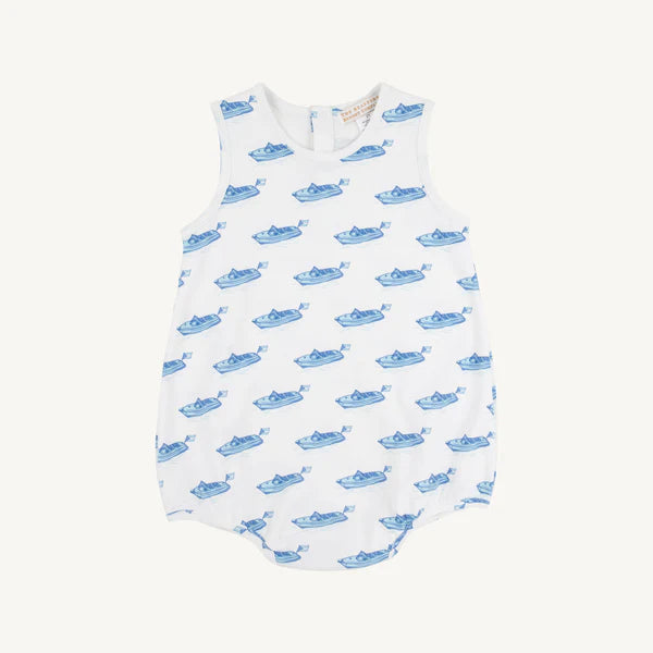 White sleeveless baby bubble romper with blue whale print pattern all over.