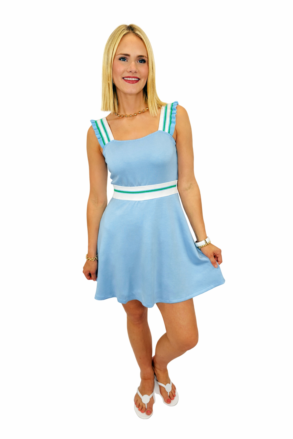 Light blue sleeveless mini dress with white and green striped trim on straps and waist