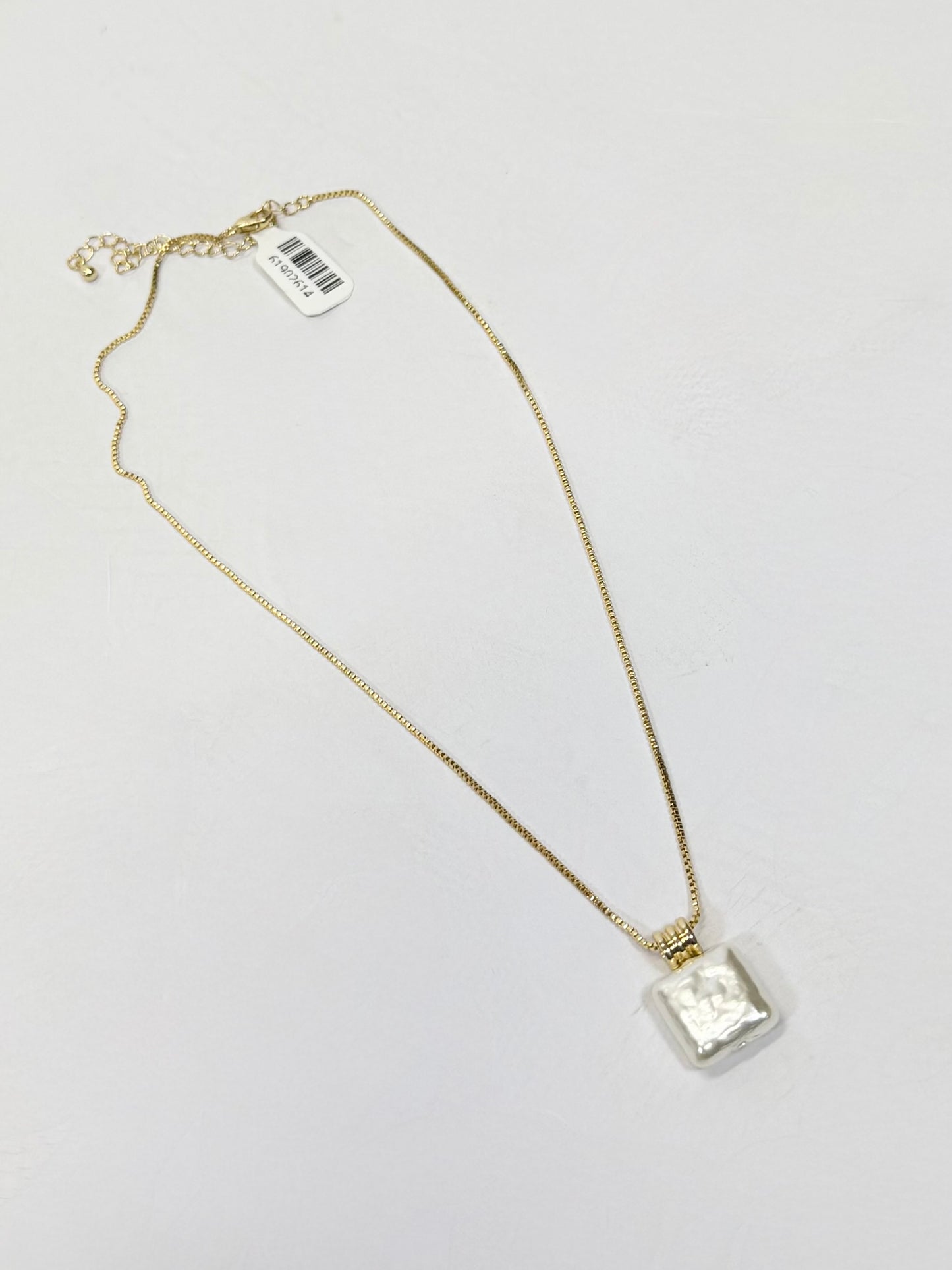 Gold box chain necklace with square freshwater pearl pendant and lobster clasp closure, adjustable 16-18 inches.
