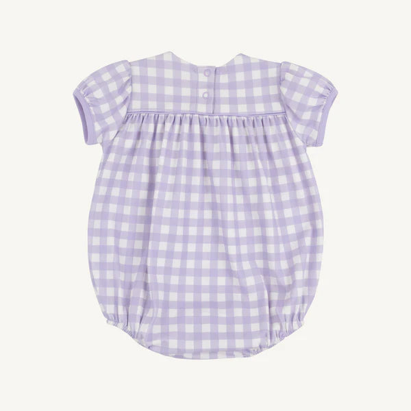 Purple and white gingham checkered baby bubble romper with short puffed sleeves and gathered hem.