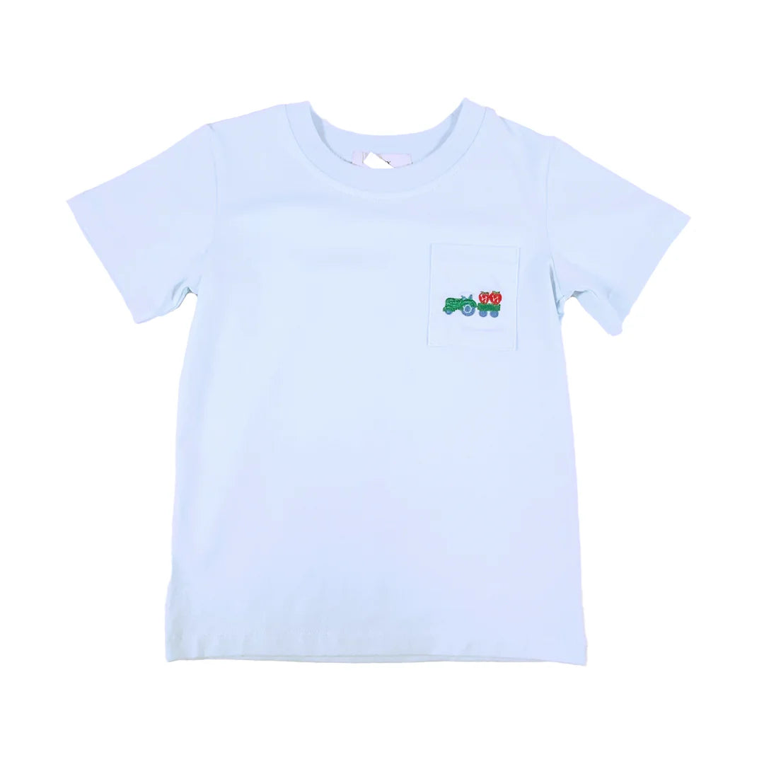 Light blue baby boy's t-shirt with embroidered green tractor and red strawberry design on chest pocket.