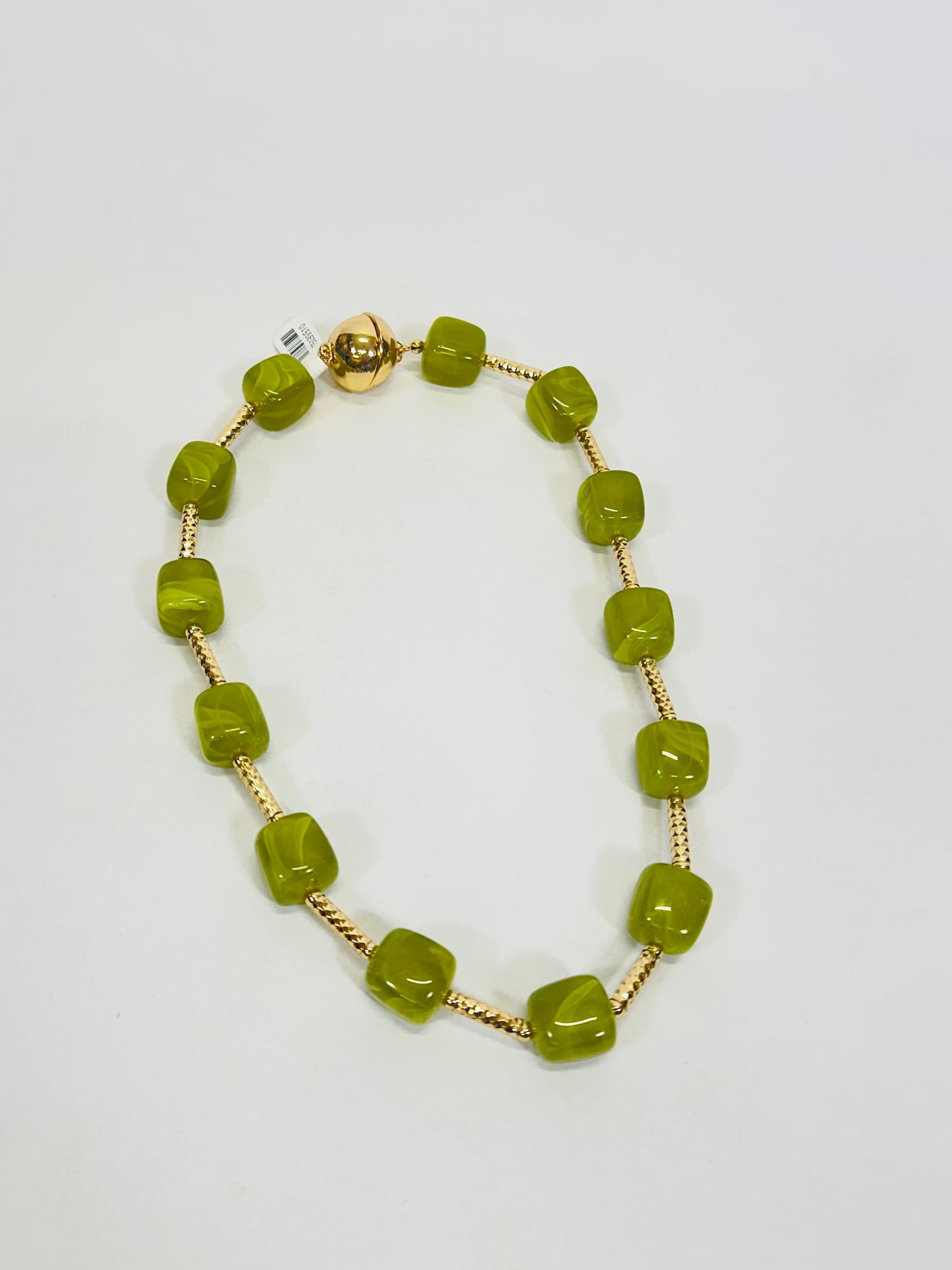 Olive green chunky cube beaded necklace with gold textured bar links and round gold clasp.