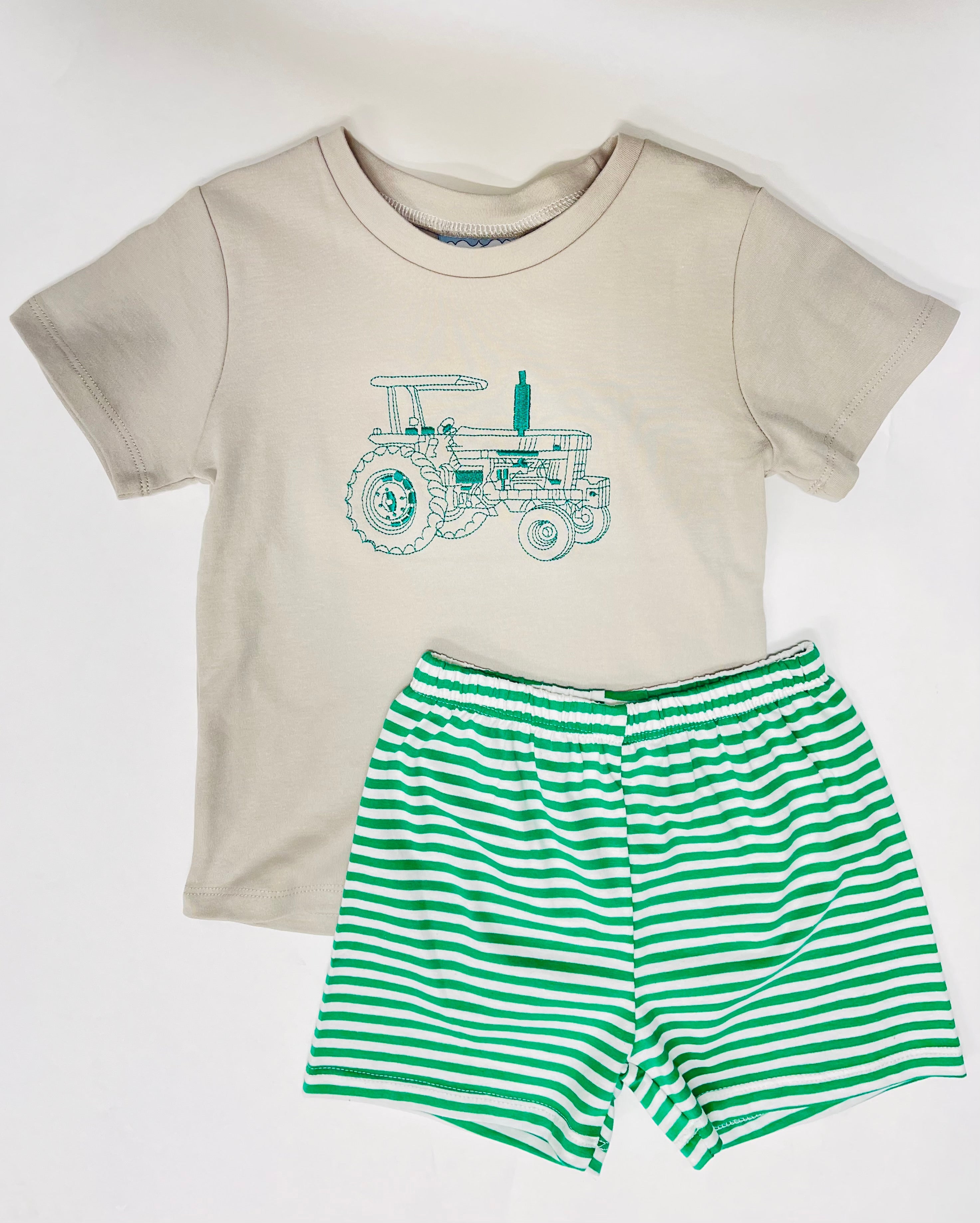 Beige t-shirt with green embroidered tractor and matching green striped shorts baby outfit set