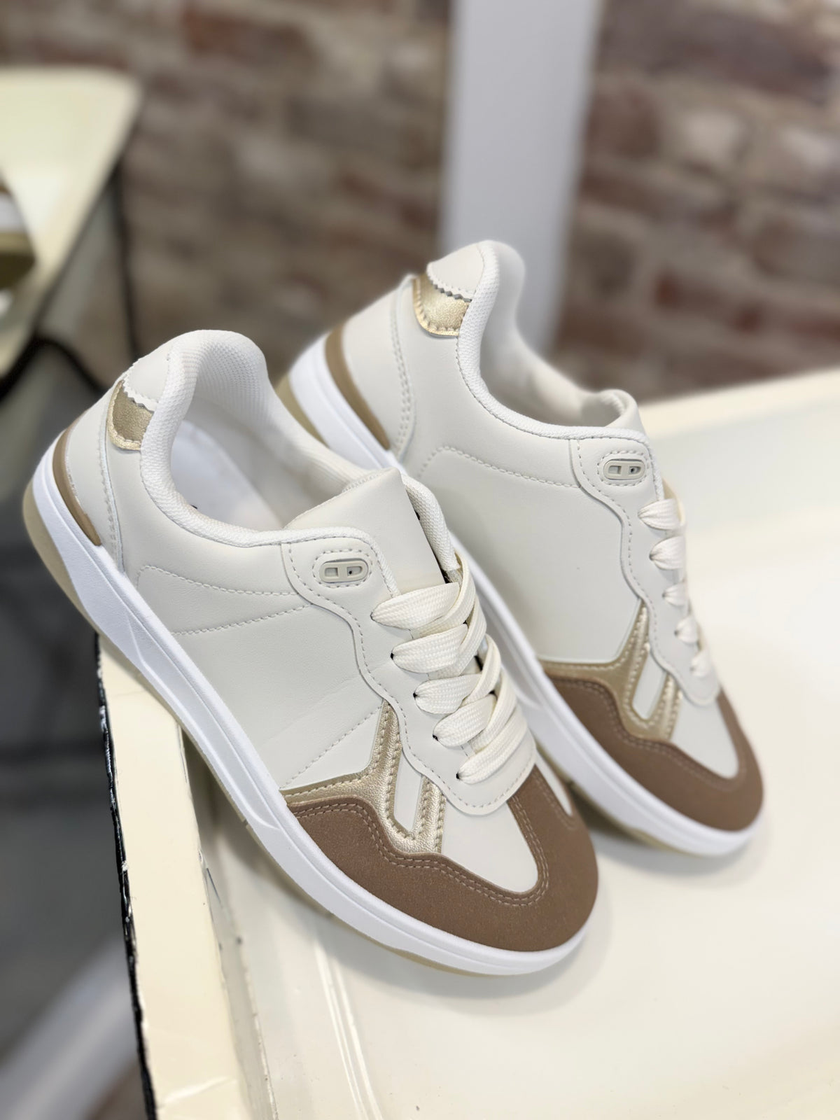 Maxine Sneaker in white leather with tan suede and gold metallic accent panels, lace-up style.