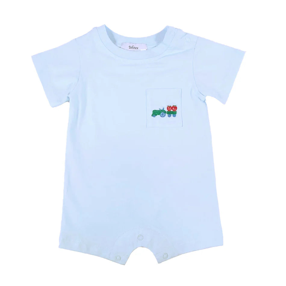 Light blue baby romper with short sleeves and embroidered tractor with strawberries on chest pocket.