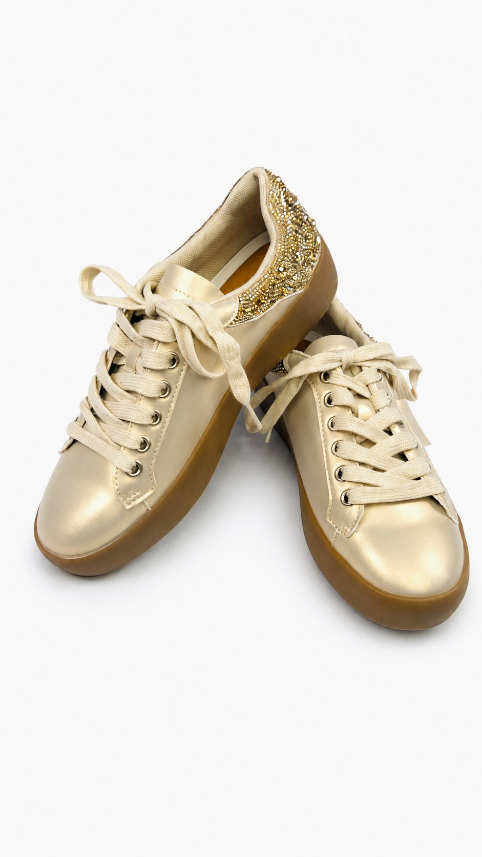 Gold metallic lace-up sneakers with crystal embellished heel collar and gum rubber sole.