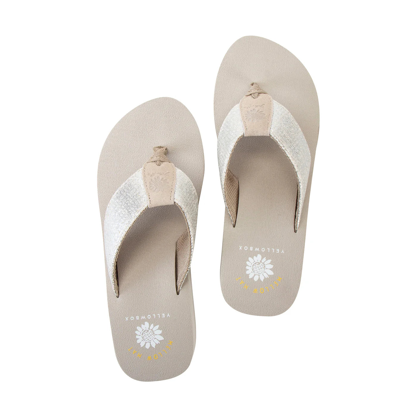Pair of beige and white Leyla flip flops with textured straps and branded footbed soles.