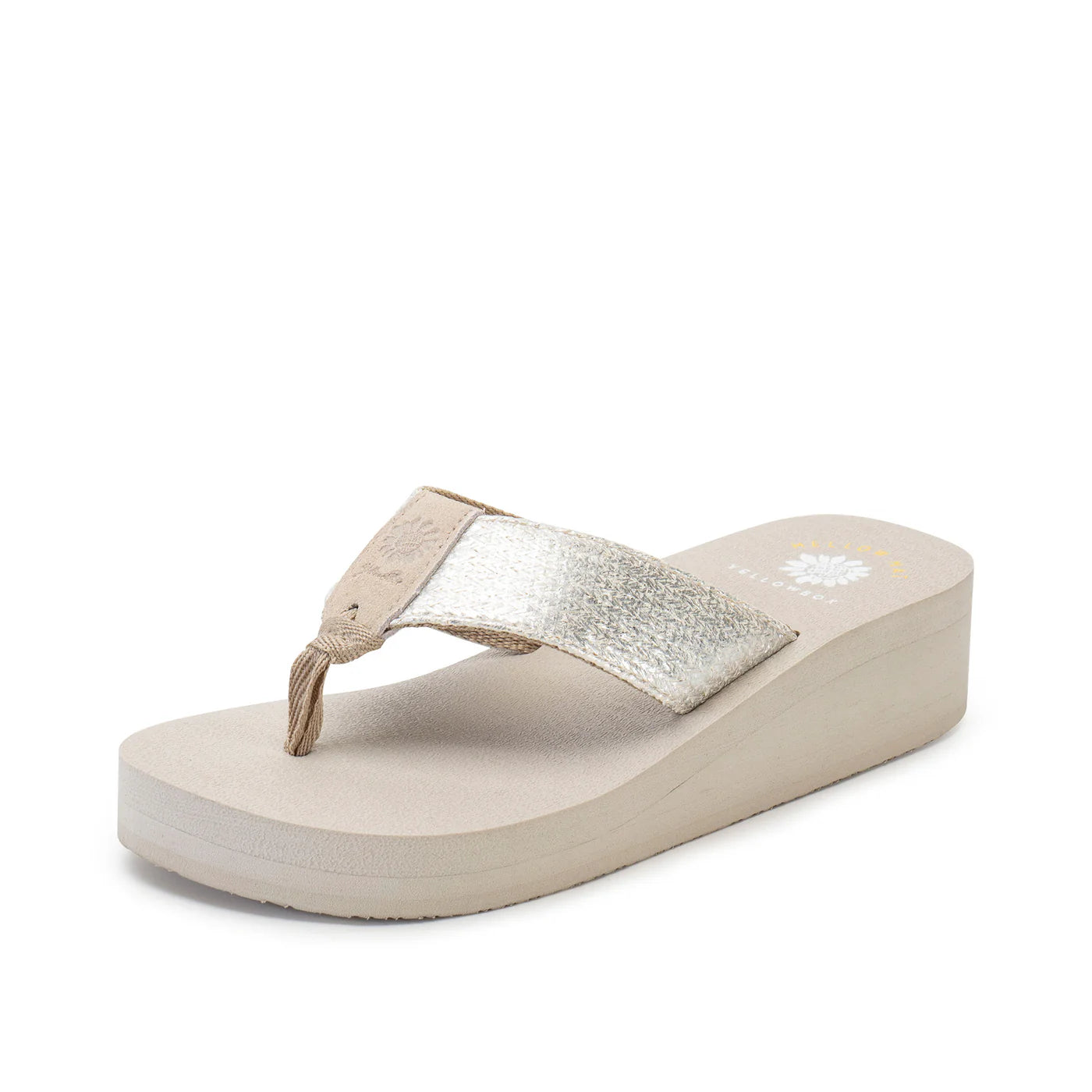 Beige platform flip flop sandal with metallic silver strap and wedge sole