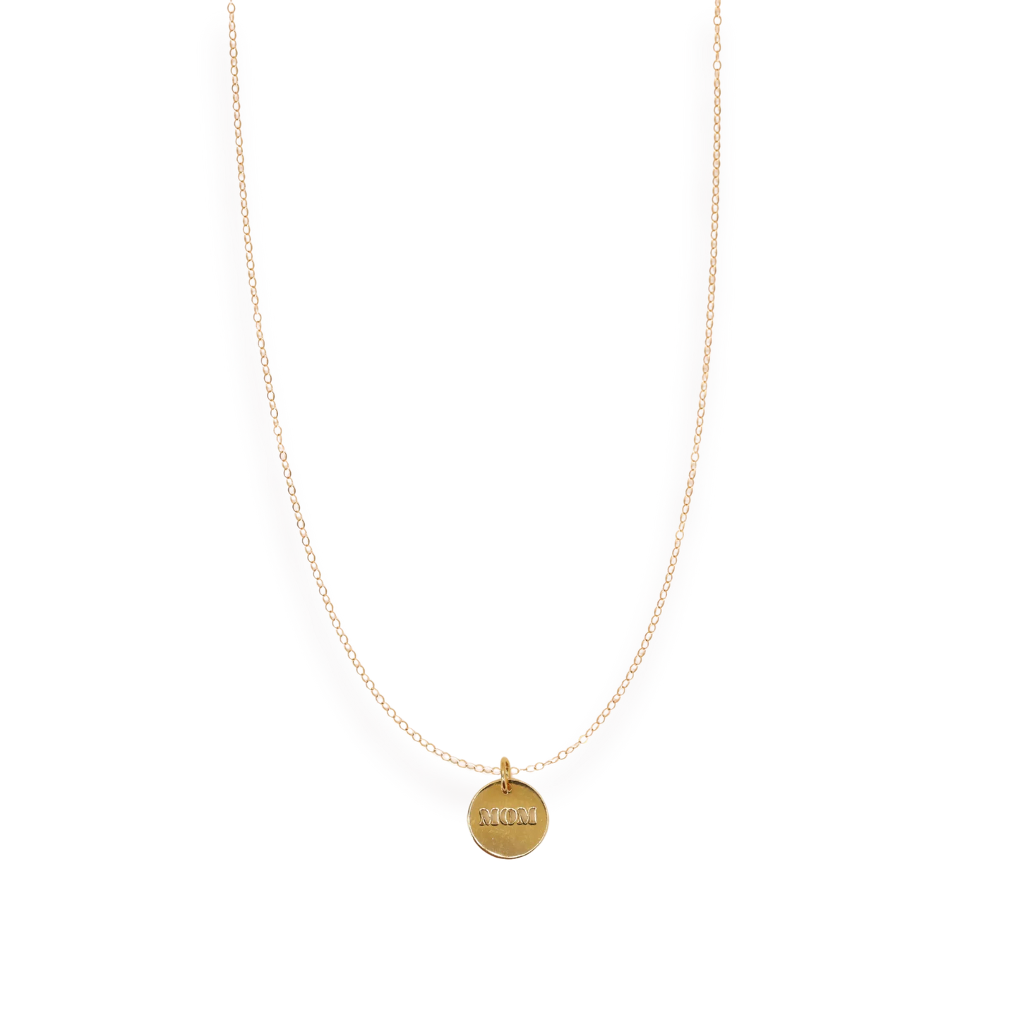 Layered gold chain necklace with circular "MOM" charm pendant on transparent background
