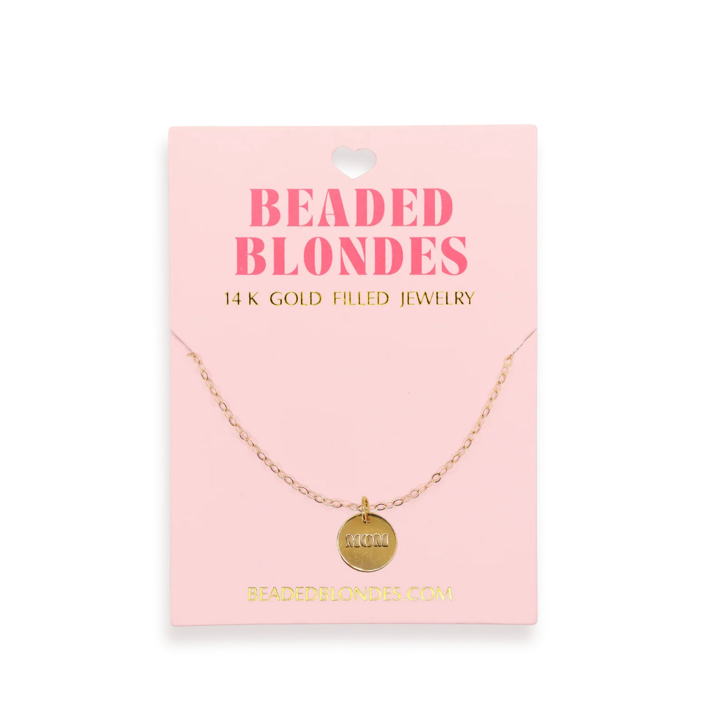 Gold filled necklace with circular "MOM" charm on pink Beaded Blondes jewelry packaging card