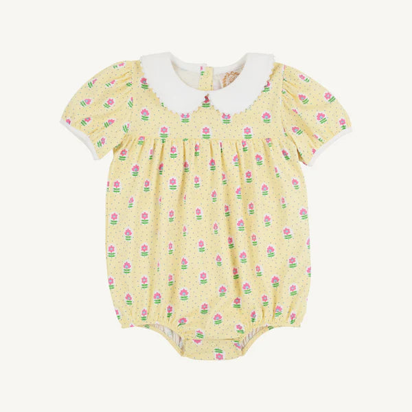 Yellow pima cotton baby bubble romper with colorful cupcake print and white Peter Pan collar.
