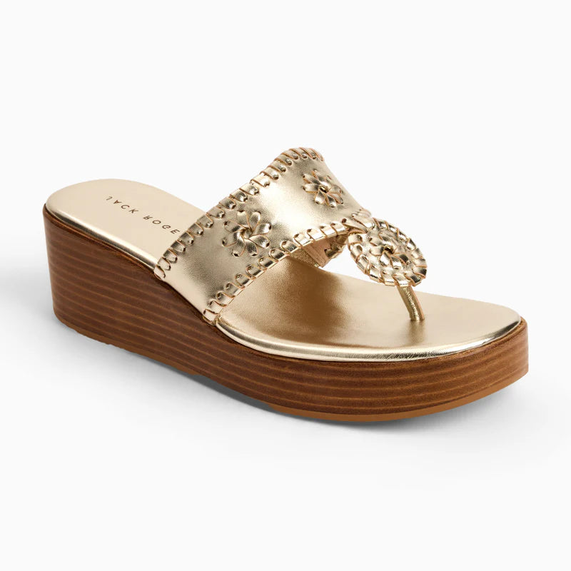 Gold leather wedge sandal with decorative cutout strap and brown wooden platform heel