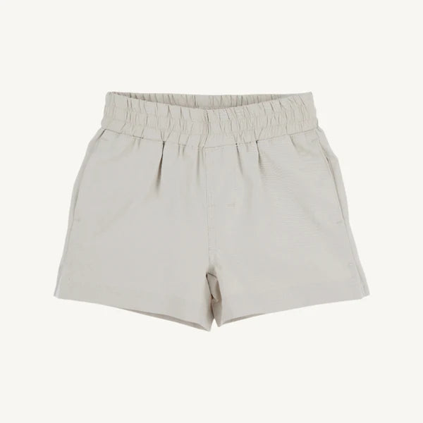 Light gray baby shorts with elastic waistband and pockets on neutral background