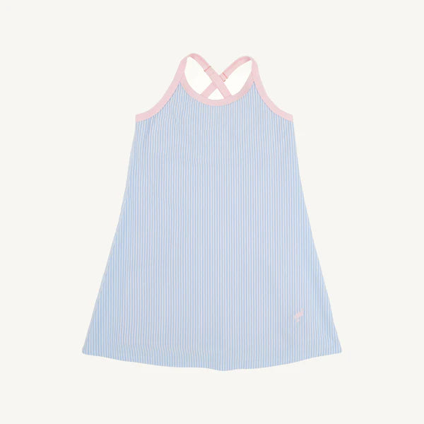 Light blue seersucker baby tennis dress with pink contrast straps and crossed back detail.