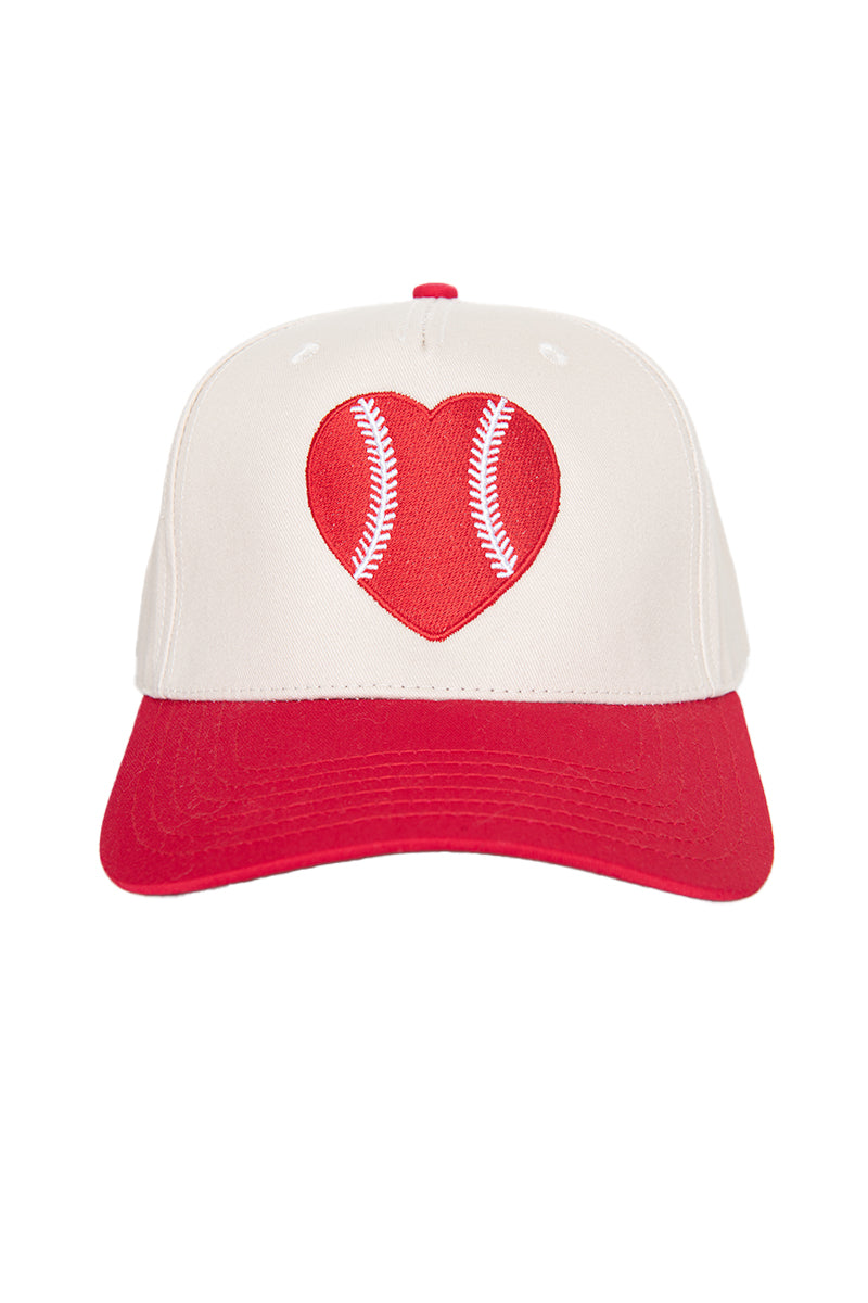 White and red trucker hat with embroidered red heart-shaped baseball design on front panel.