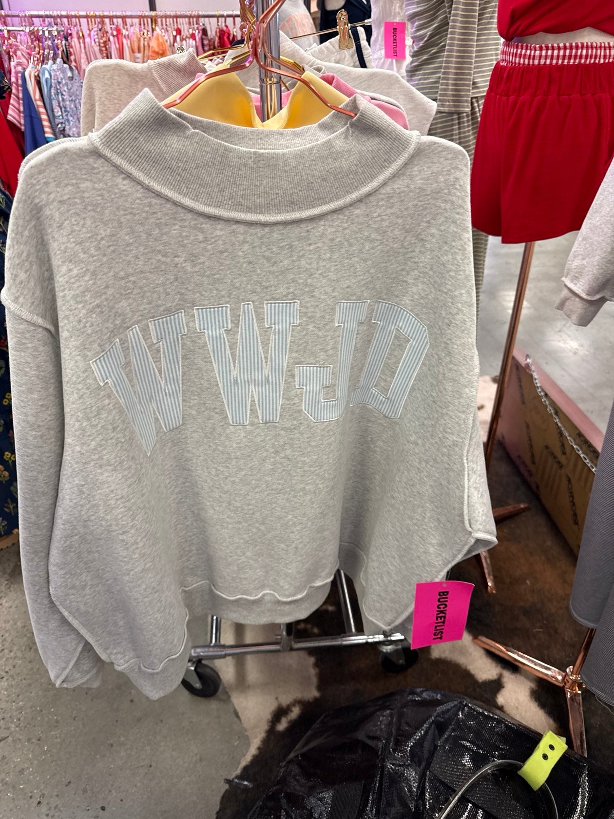 Gray heather mock neck cropped sweatshirt with embroidered WWJD lettering in varsity style font.