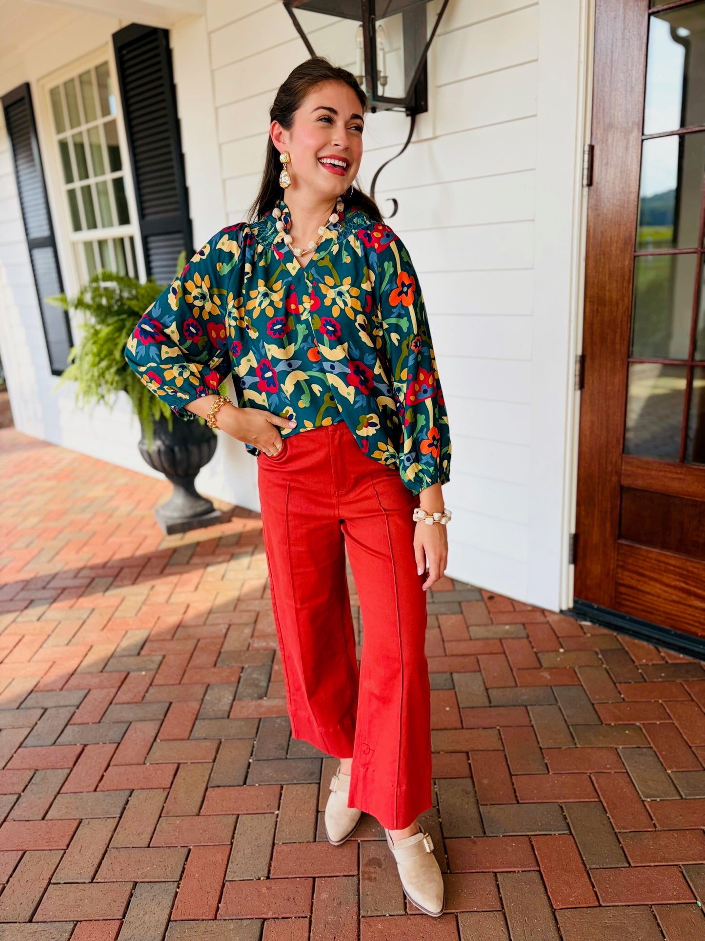Rachel Seamed Front Pants, a rust red high waisted wide leg pant with front seam detail in soft stretch cotton. Sizes small to large. You will love the rusty red color for fall and winter!