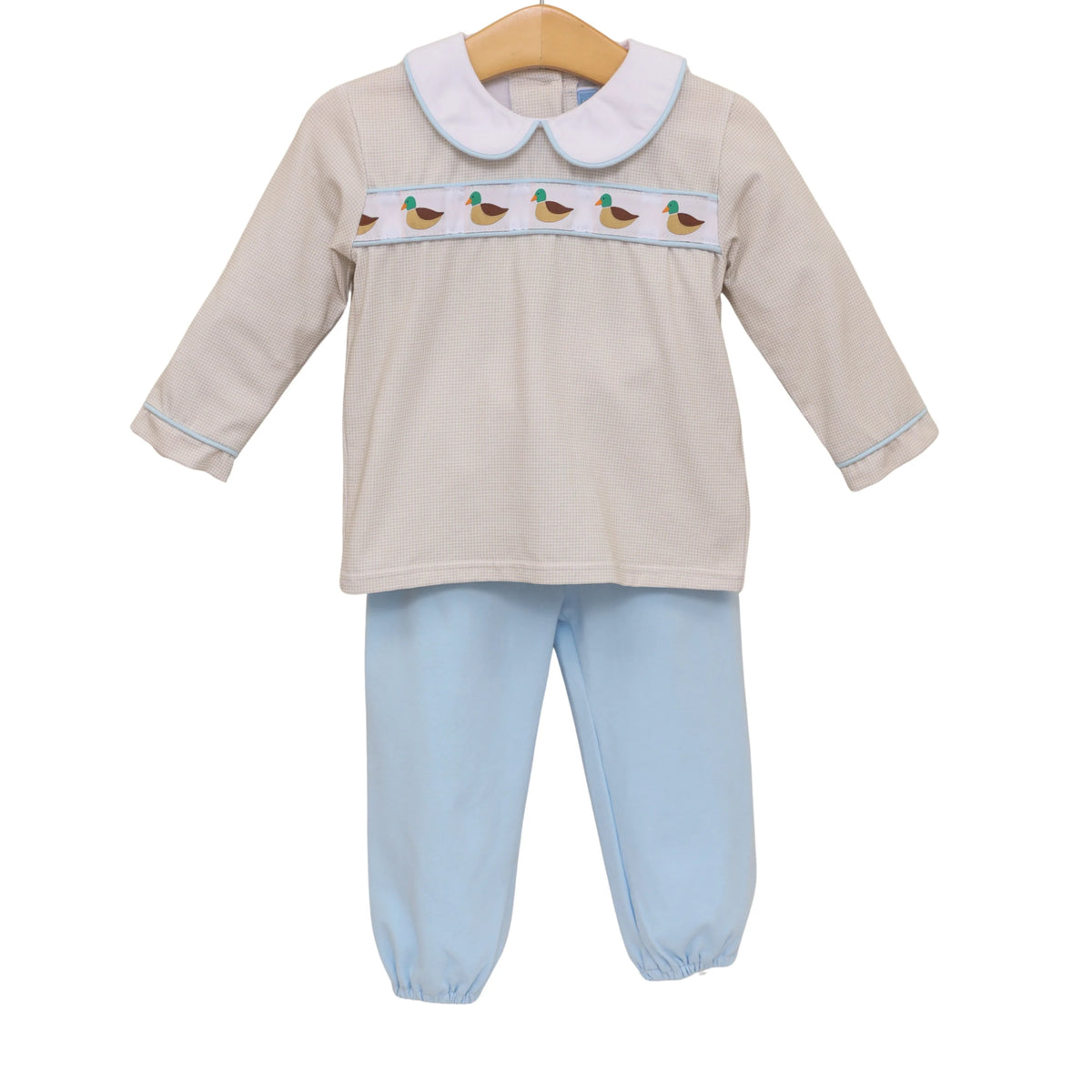 Toddler boy's two-piece set featuring beige smocked top with mallard duck embroidery and light blue bloomer pants.