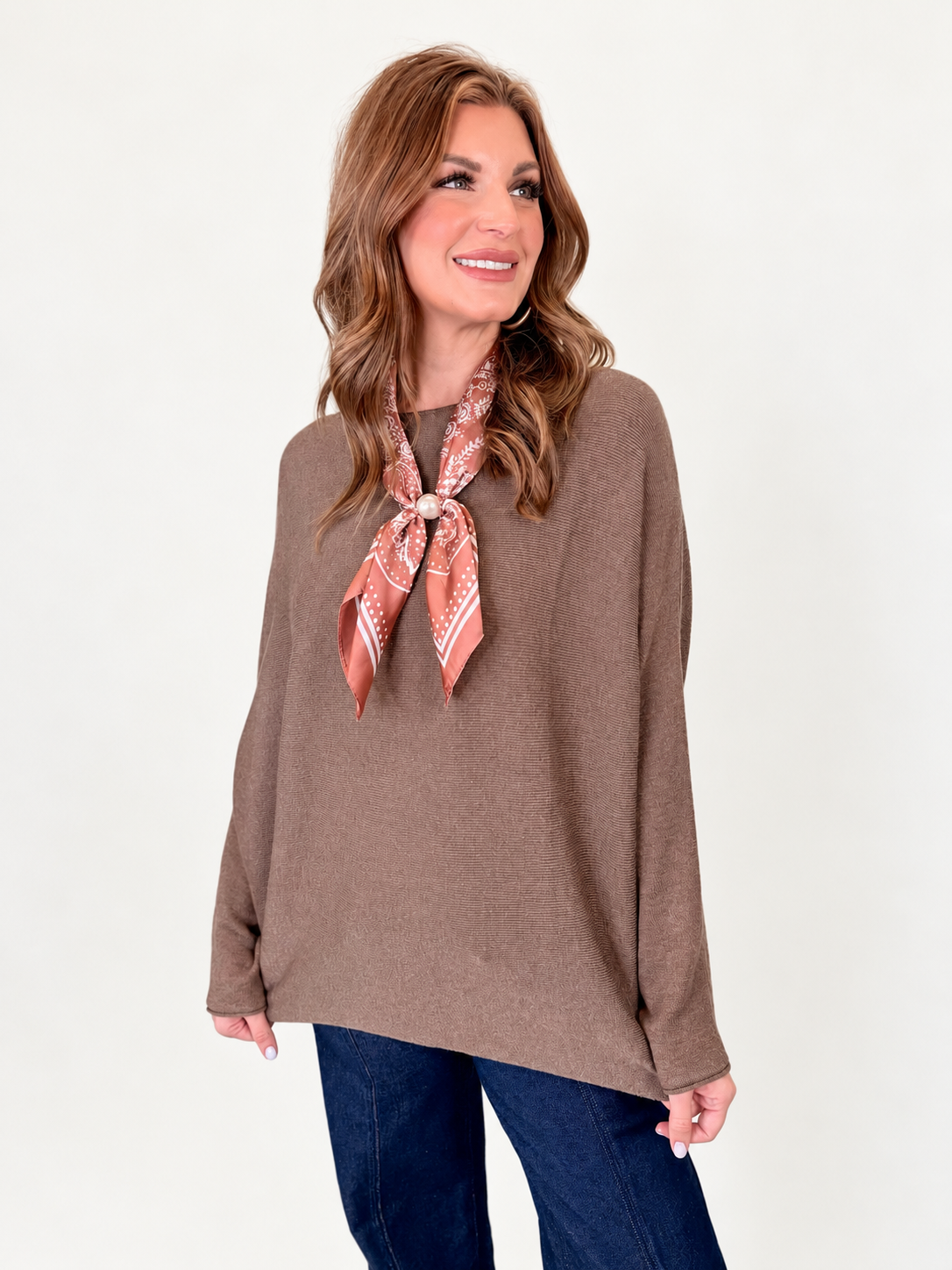 Closer view of the Finley mocha knit top showing its round neckline, soft texture and relaxed silhouette.