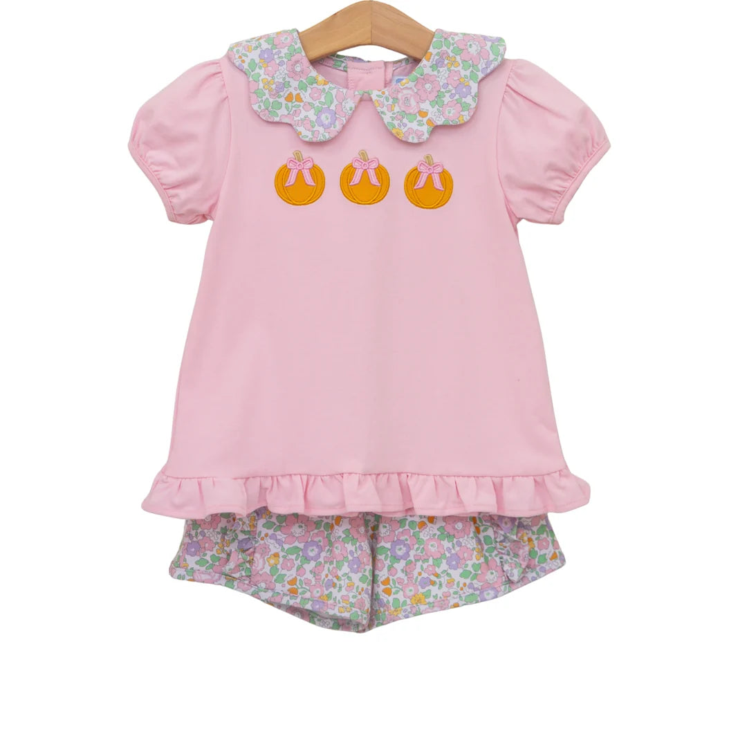 Girls' pink short set with three pumpkin appliqués, floral Peter Pan collar, and matching floral shorts.
