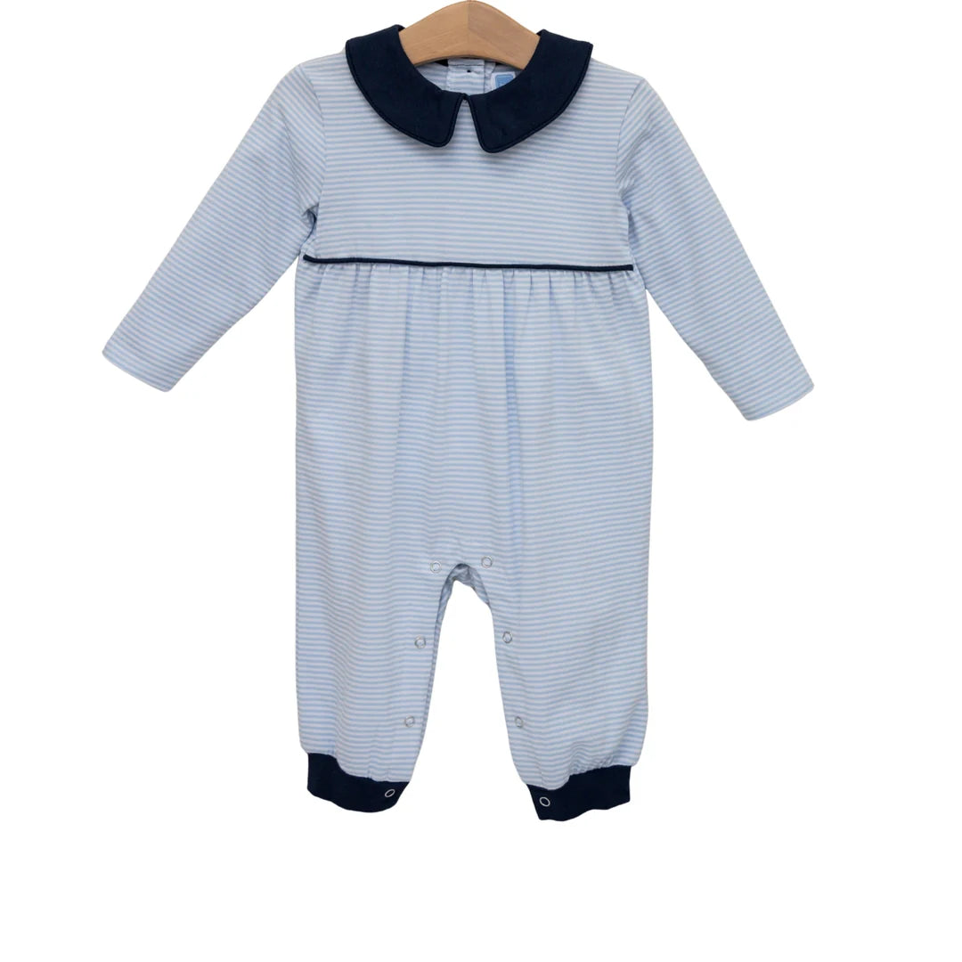 Baby romper in light blue stripes with navy Peter Pan collar and navy ankle cuffs.
