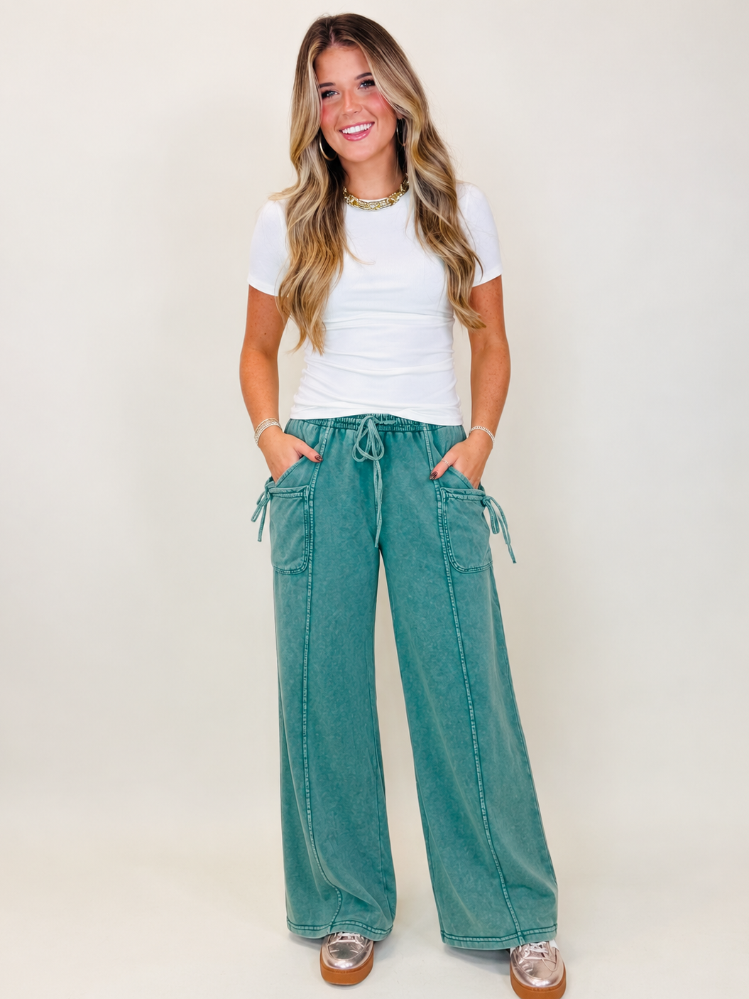 Saylor pine green mineral-wash wide-leg cargo pants with a drawstring waist and side pockets